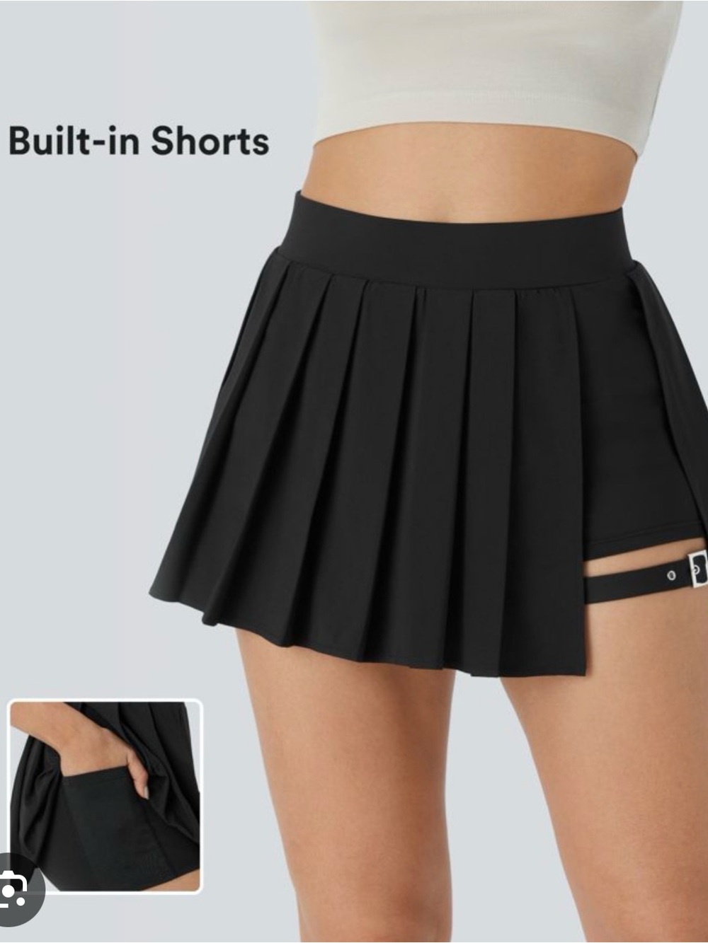 High waisted pleated skirt with pocket and adjustable buckle